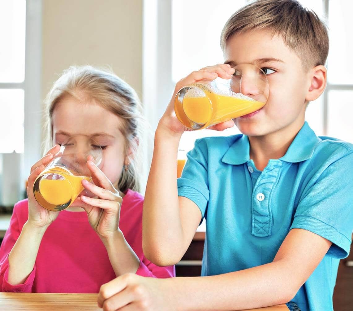 Children Drinking Juice