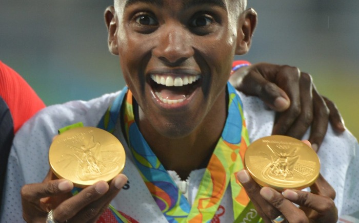 Farah at the 2016 Olympics podium with his two gold medals